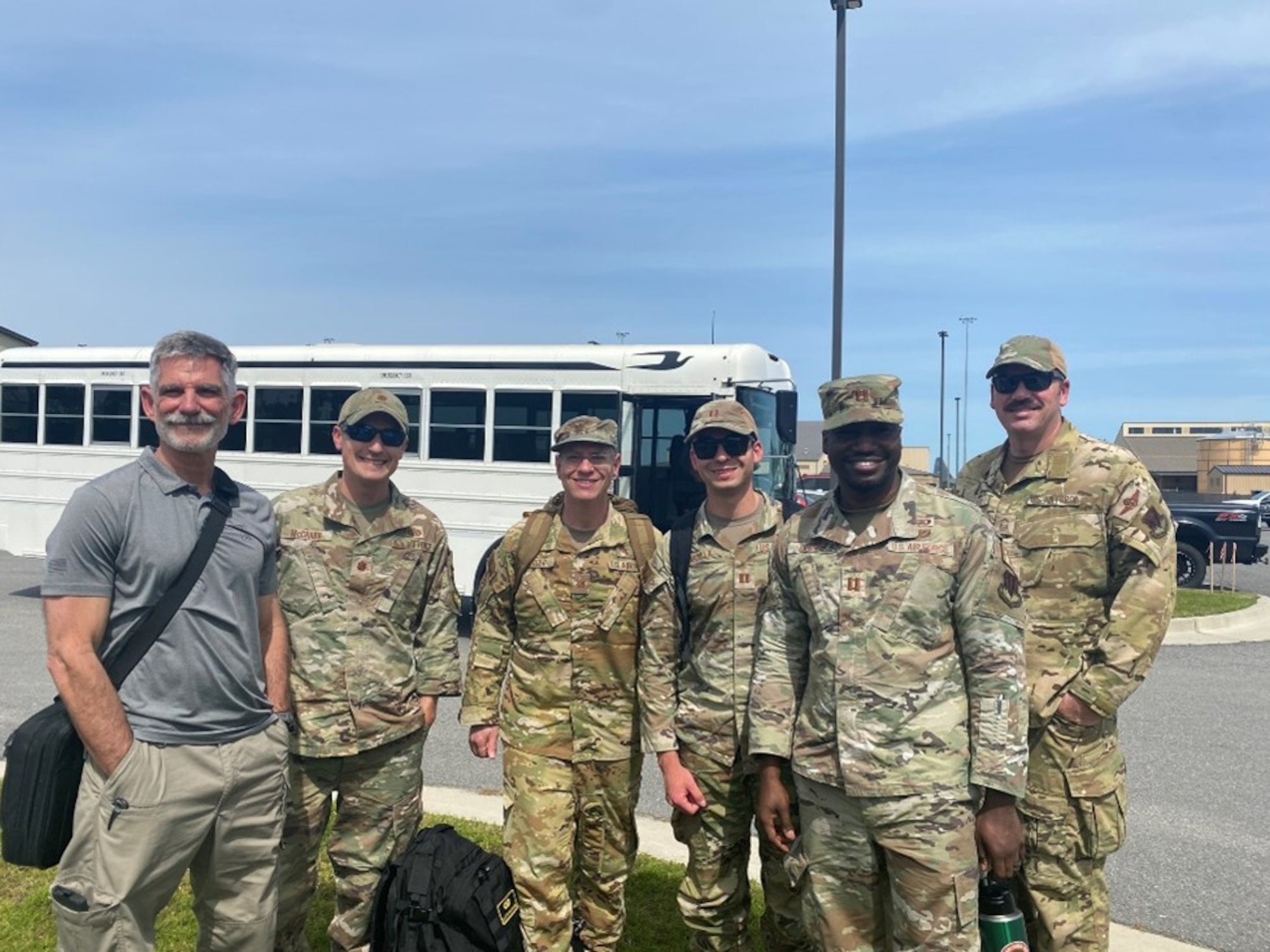 U.S. Air Force Maj. Jeremy Berger, 23rd Medical Group, chief of aerospace medicine poses for a group photo In Savannah, Georgia, April 18, 2024. Berger provided medical command and control, medical intelligence assessment and executed medical planning to include aeromedical evacuation requirements during exercise Ready Tiger 24-1. (Courtesy photo by U.S. Air Force Maj. Jeremy Berger)