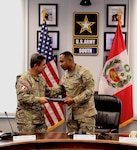 Peruvian Army Chief of Staff, Lt. Gen. Orestes Martin Vargas Ortiz, and U.S. Army South Commanding General Maj. Gen. Wiliam L. Thigpen celebrate the signing of 46 agreed-to actions during the 10th Annual U.S.-Peru Army Staff talks, May 9, 2024 at U.S. Army South Headquarters, Fort Sam Houston, Texas. The U.S. Army Staff Talks program serves as a bilateral forum for strategic-level discussion between respective armies to develop professional partnerships and increase interaction between partner nation armies.