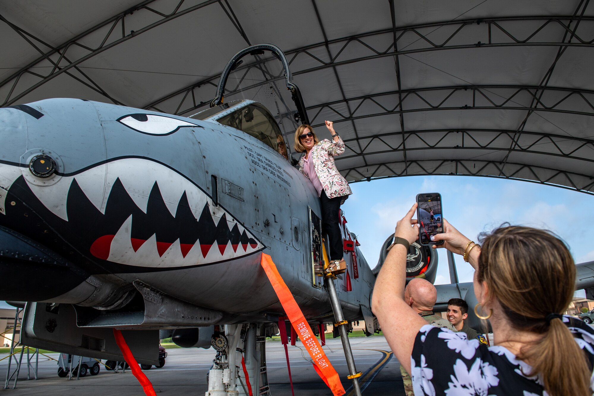 Sandra Wilcher, Lowndes County Schools superintendent, poses for a photo with an A-10C Thunderbolt II at Moody Air Force Base, Georgia, May 9, 2024. Wilcher and other members of the Moody School Board Liaison Committee meet quarterly to advocate for military families and their school-age children. (U.S. Air Force Photo by Senior Airman Courtney Sebastianelli)