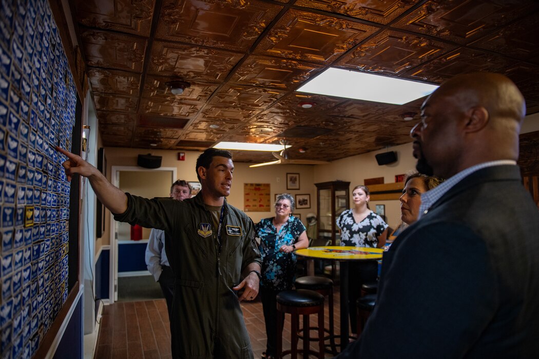U.S. Air Force Capt. Kevin Domingue, 74th Fighter Squadron pilot, briefs the Moody School Board Liaison Committee during a base tour at Moody Air Force Base, Georgia, May 9, 2024. Domingue explained the mission, operations tempo and heritage of Moody AFB. (U.S. Air Force Photo by Senior Airman Courtney Sebastianelli)