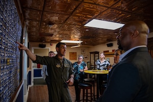 U.S. Air Force Capt. Kevin Domingue, 74th Fighter Squadron pilot, briefs the Moody School Board Liaison Committee during a base tour at Moody Air Force Base, Georgia, May 9, 2024. Domingue explained the mission, operations tempo and heritage of Moody AFB. (U.S. Air Force Photo by Senior Airman Courtney Sebastianelli)