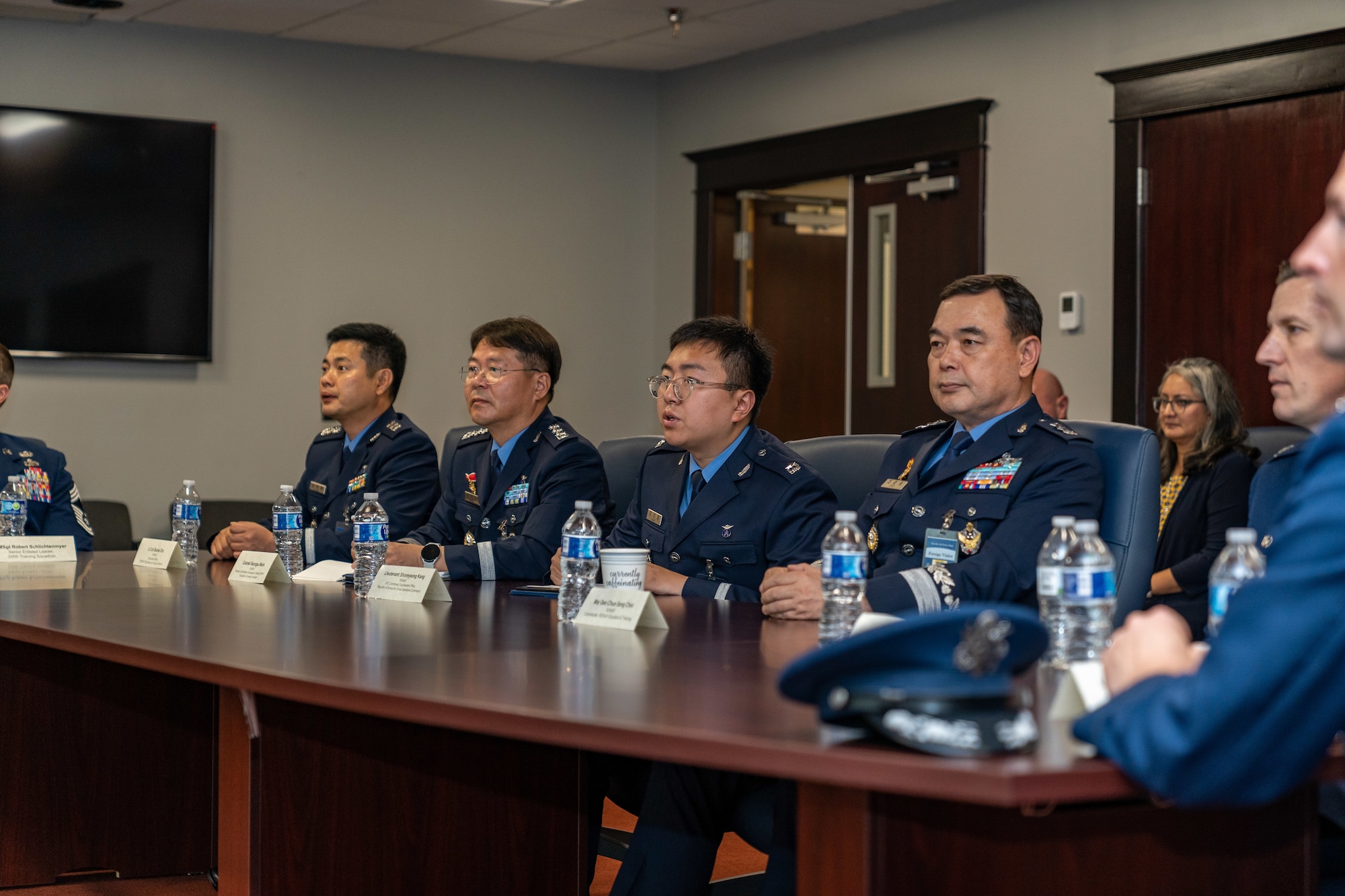 Republic of Korea Air Force Education and Training Command leadership listen to a brief on how weather is taught at the 81st Training Wing during their visit to Keesler Air Force Base, Mississippi, May 9, 2024. ROKAF leaders visited Keesler to learn more about how the USAF is improving technical training for each specialty using advanced technologies. (U.S. Air Force photo by Andrew Young)