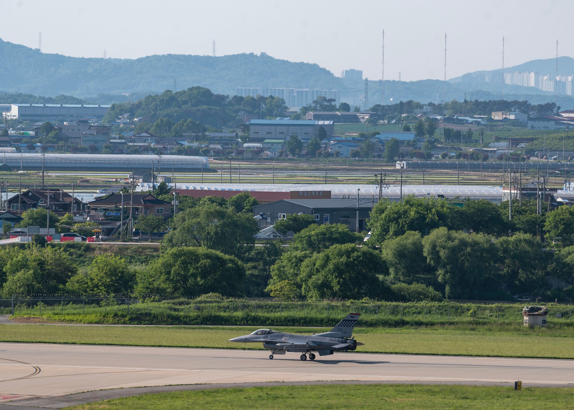 A U.S. Air Force F-16 Fighting Falcon assigned to the 36th Fighter Squadron taxis on the flight line during Beverly Herd 24-1 at Osan Air Base, Republic of Korea, May 15, 2024. As the most forward deployed permanently based wing in the Air Force, the 51st Fighter Wing is charged with providing mission-ready Airmen to execute combat operations and receive follow-on forces. Routine training events like Beverly Herd are pivotal platforms for 51st Fighter Wing Airmen to refine their warfighting proficiencies through practical application, concurrently enhancing their ability to respond skillfully to contingencies. (U.S. Air Force Staff Sgt. Aubree Owens)
