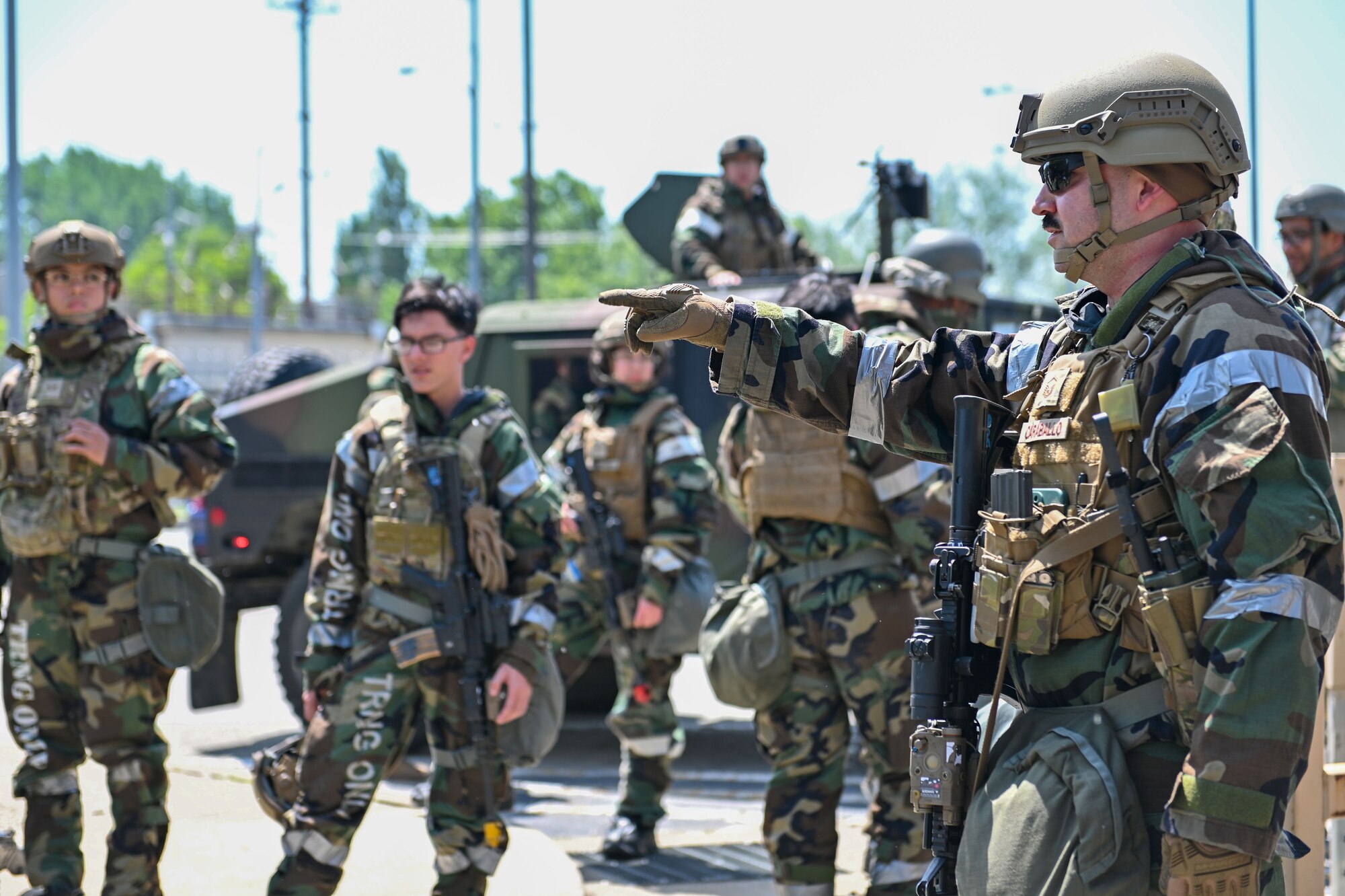 U.S. Air Force Master Sgt. Antonio Caraballo, 51st Security Forces Squadron bravo flight chief, initiates an after-action brief following ground attack training during Beverly Herd 24-1 at Osan Air Base, Republic of Korea, May 13, 2024. The Airmen of the 51st Fighter Wing continuously train to maintain the high level of full spectrum readiness required to execute the mission proficiently and effectively. Routine training events like Beverly Herd are pivotal platforms for 51st Fighter Wing Airmen to refine their warfighting proficiencies through practical application, concurrently enhancing their ability to respond skillfully to contingencies. (U.S. Air Force photo by Staff Sgt. Aubree Owens)