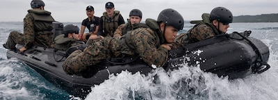 (May 14, 2024) U.S. Marines with III Marine Expeditionary Force operate combat rubber raiding crafts during an incidental combat rubber raiding craft course at Naval Base White Beach, May 14, 2024, Okinawa, Japan. The course was hosted by...