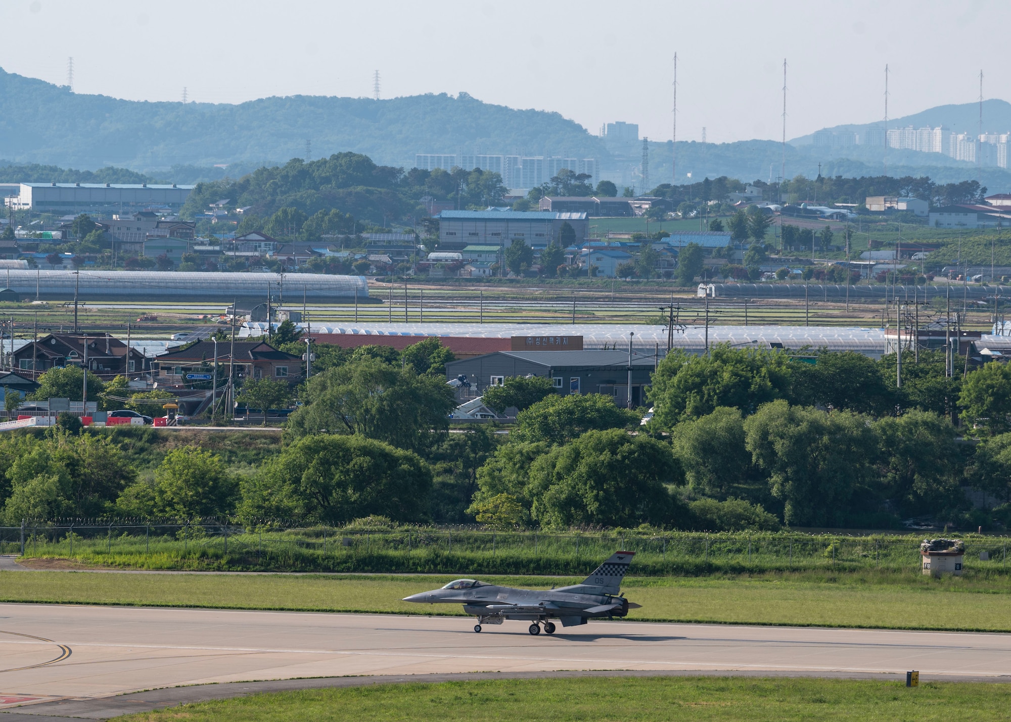 A U.S. Air Force F-16 Fighting Falcon assigned to the 36th Fighter Squadron taxis on the flight line during Beverly Herd 24-1 at Osan Air Base, Republic of Korea, May 15, 2024. As the most forward deployed permanently based wing in the Air Force, the 51st Fighter Wing is charged with providing mission-ready Airmen to execute combat operations and receive follow-on forces. Routine training events like Beverly Herd are pivotal platforms for 51st Fighter Wing Airmen to refine their warfighting proficiencies through practical application, concurrently enhancing their ability to respond skillfully to contingencies. (U.S. Air Force Staff Sgt. Aubree Owens)