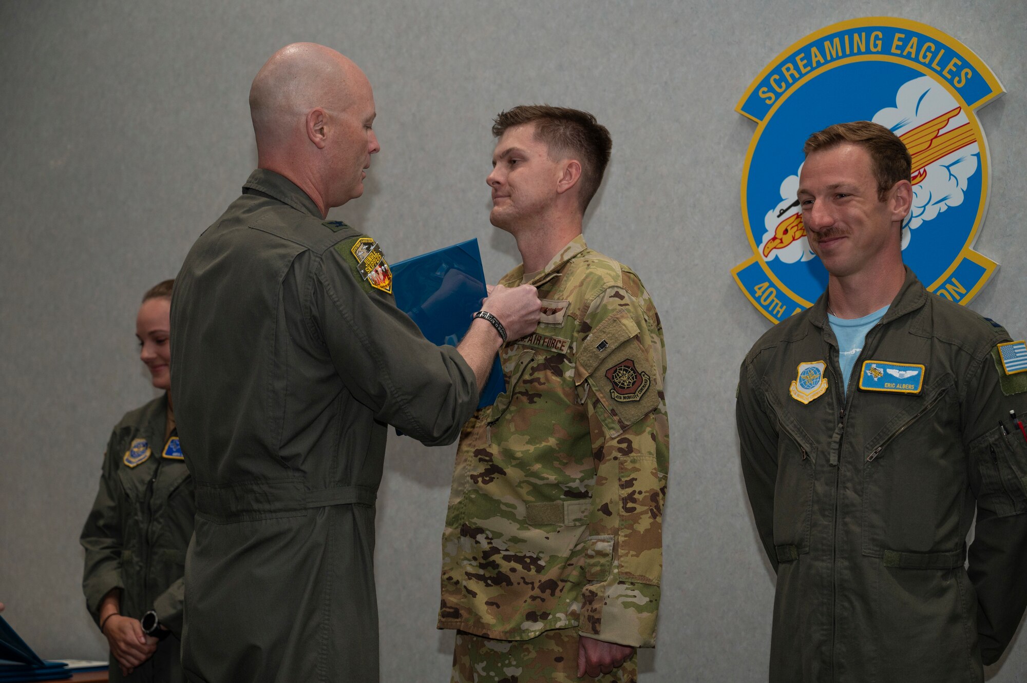 Airmen stand during the presentation of medals