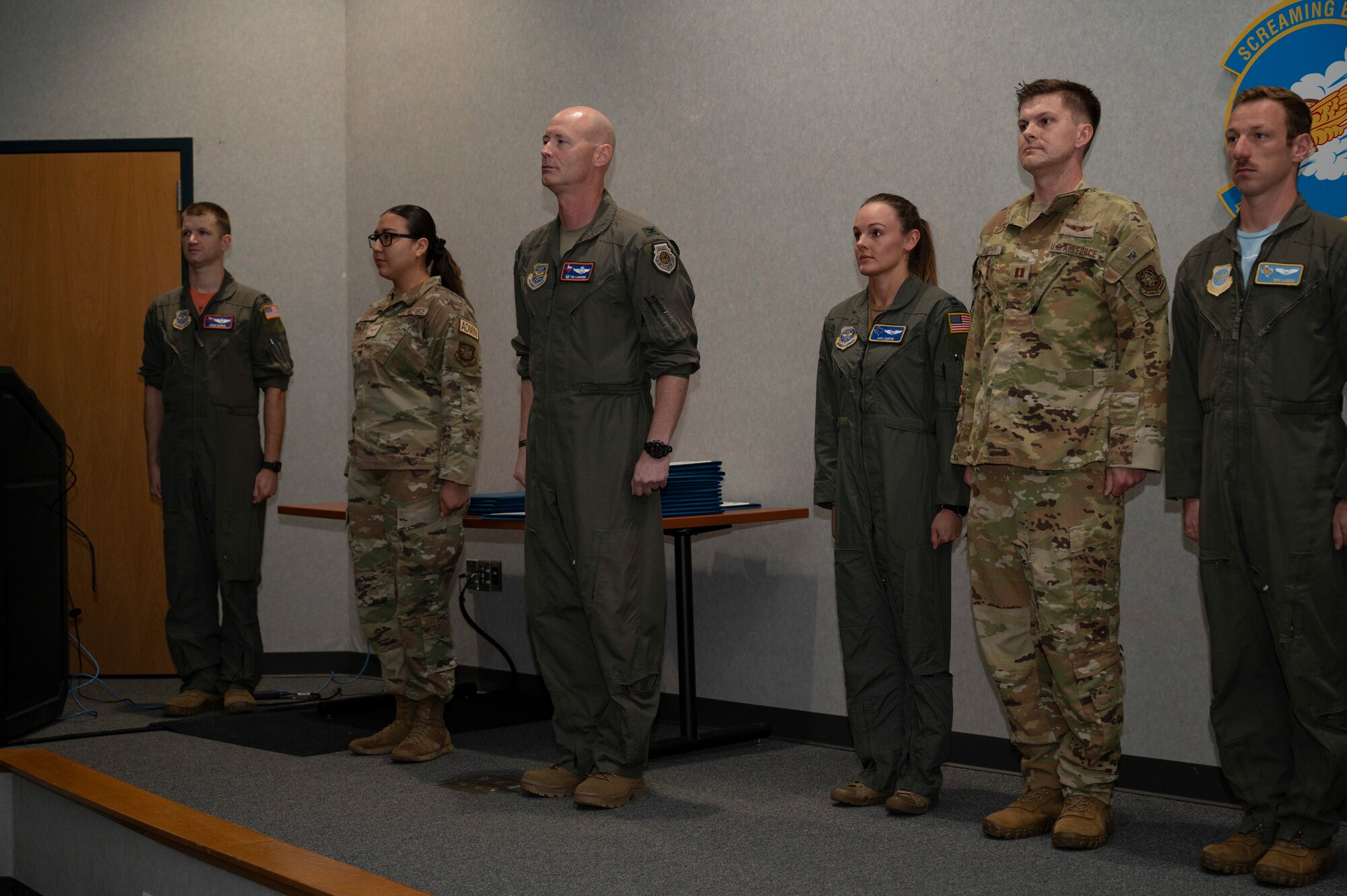 Airmen stand during the presentation of medals