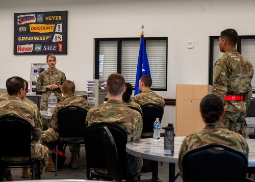 U.S. Air Force Maj. Gen. Michele Edmondson, Second Air Force commander, talks with a student during the Basic Military Training welcome brief at Goodfellow Air Force Base, Texas, May 7, 2024. Edmondson emphasized to new Airmen the critical significance of their roles within the Air Force, as understanding this fosters a culture of dedication and excellence and instills a sense of purpose, responsibility and commitment essential for mission success. (U.S. Air Force photo by Senior Airman Sarah Williams)