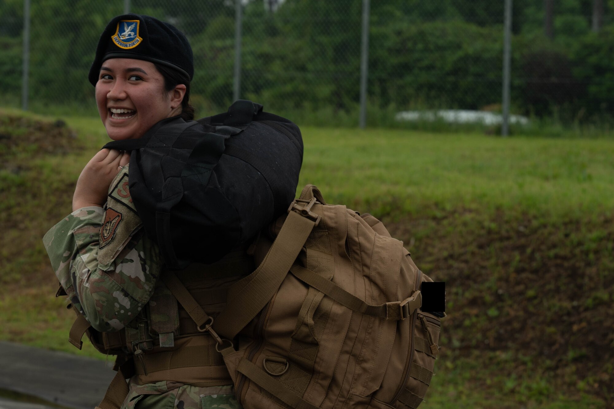 An Airman walks during a ruck.