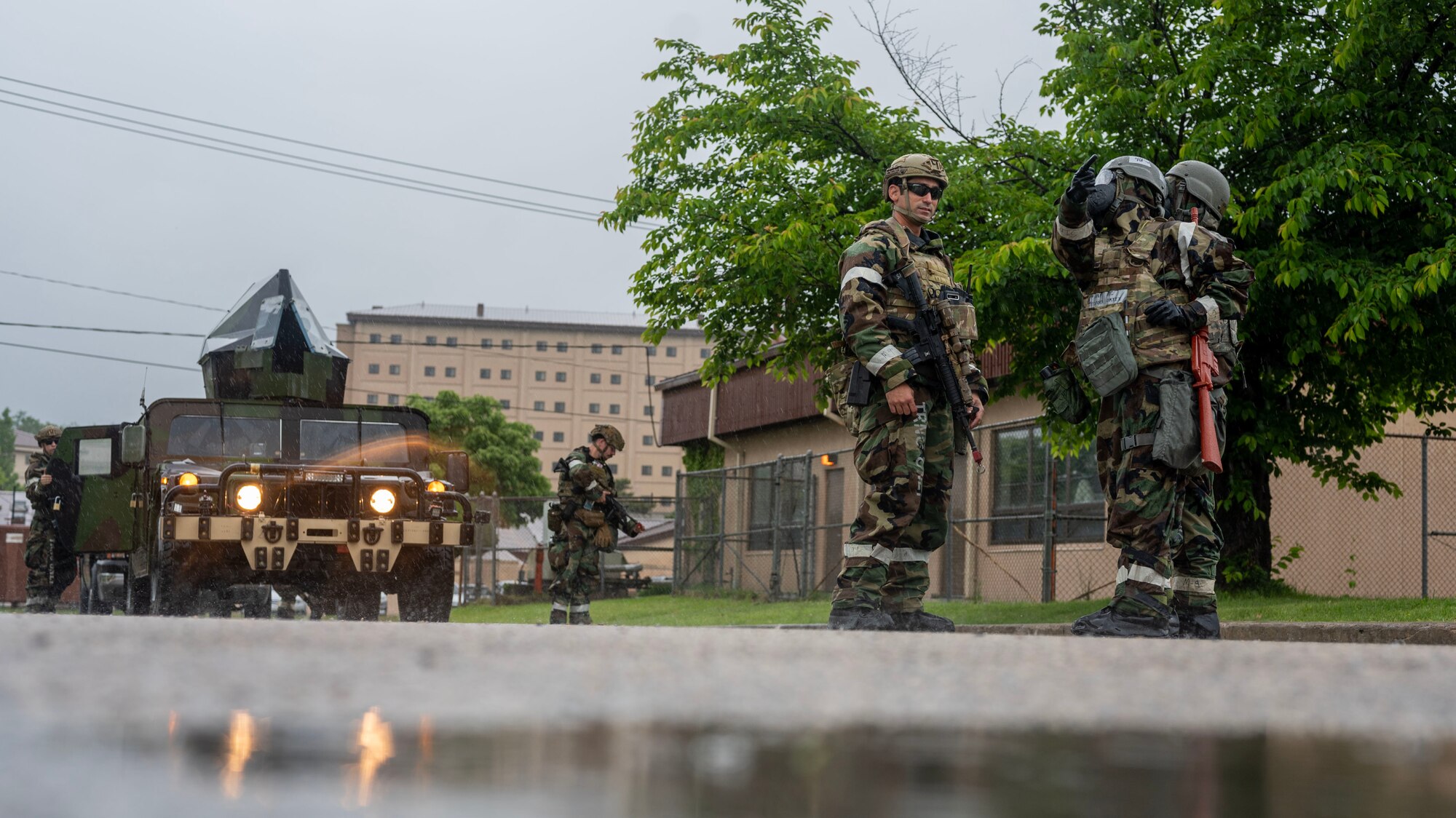 U.S. Air Force explosive ordnance disposal team members with the 51st Civil Engineer Squadron, arrive at an inert ordnance scene near the 51st Medical Group during Beverly Herd 24-1 at Osan Air Base, Republic of Korea, May 15, 2024. The 51st CES EOD mission is to clear and defend the base from explosive hazards. Routine training events like Beverly Herd, are pivotal platforms for 51st Fighter Wing Airmen to refine their warfighting proficiencies through practical application, concurrently enhancing their ability to respond skillfully to contingencies. (U.S. Air Force photo by Staff Sgt. Aubree Owens)