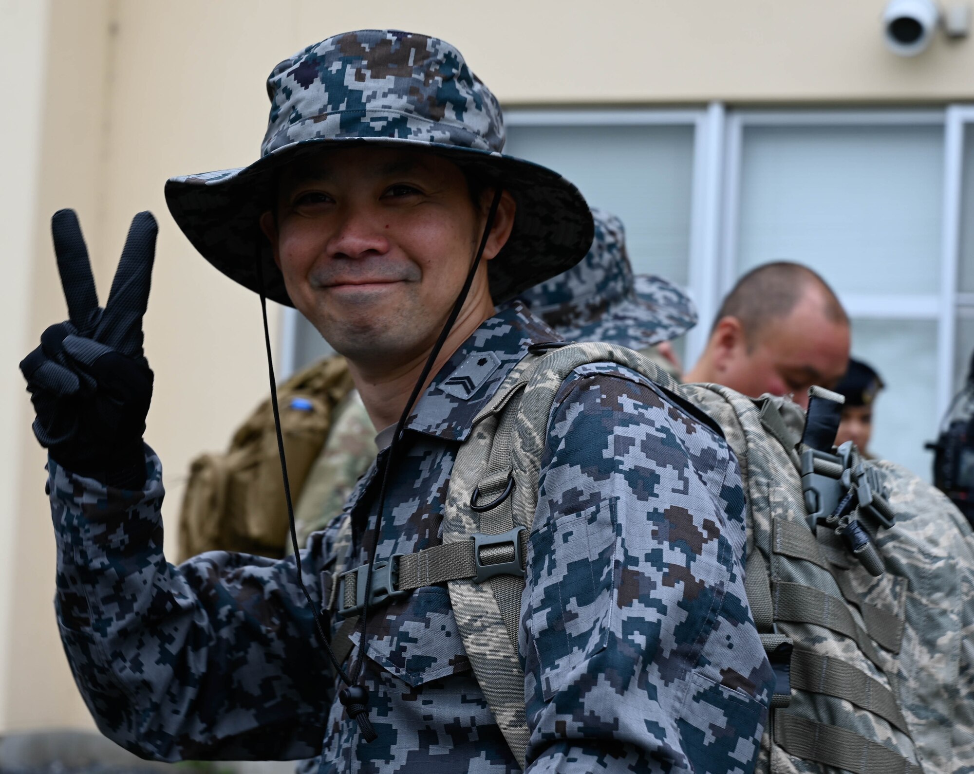 A Japanese service member poses for a photo.