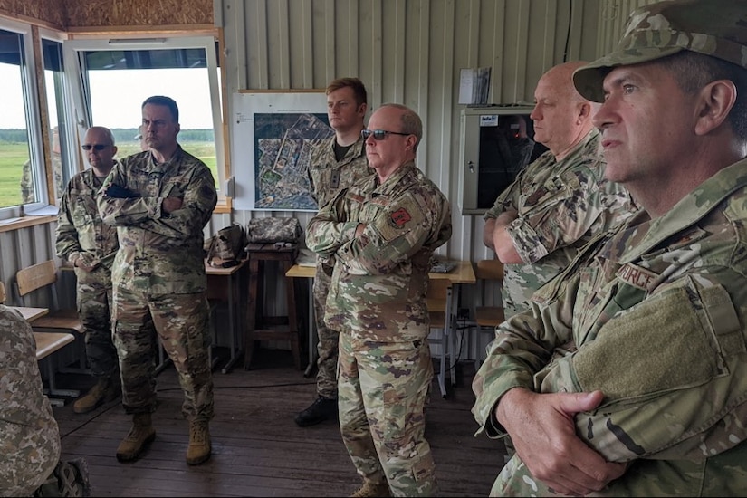 Brig. Gen. Michael Regan Jr., deputy adjutant general-Air, Pennsylvania National Guard, and other Pa. Air National Guard senior leaders visited a Lithuanian training site in Kazlu Ruda, Lithuania, on May 25, 2022, where they received briefings from Lithuanian Land Force and Special Operations Force. The group also observed A-10 and F-18 close air support exercises and met with individuals training at the site, including U.S. Air Force Joint Terminal Attack Controllers. (U.S. Air Force photo by Capt. Nathaniel Curtis)