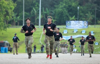 American Team competitors take part in the 2-mile run portion of the Fuerzas Comando 24 (FC24) Physical Test in Cerro Tigre, Panama, May 14, 2024.