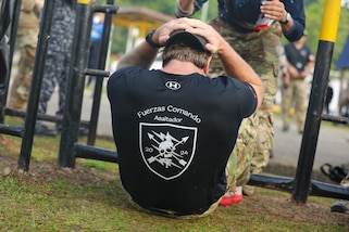 American competitor completes a sit up as part of the Fuerzas Comando 24 (FC24) Physical Test in Cerro Tigre, Panama, May 14, 2024.
