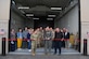 Col. Timothy Monroe, 319th Reconnaissance Wing commander, cuts ceremonial ribbon May, 15, 2024, at Grand Forks Air Force Base, North Dakota. The ceremony was held to commemorate the opening of the 319th Logistic Readiness Squadron's brand new Munitions Maintenance and Inspection Facility. The new facility includes a 1,040 sq. ft. high bay maintenance area and an adjoining 1,640 sq. ft. office building, and in total cost $3.2 million to construct. (U.S. Air Force Airman 1st Class Colin Perkins)