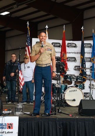 U.S. Marine Corps Sgt.Maj. Carlos A. Ruiz, the 20th Sergeant Major of the Marine Corps, and Marines with Recruiting Station Kansas City attend the 9th Annual Friends In Service of Heroes Armed Forces Celebration Day at New Century, Kansas on May 4th, 2024. Sgt.Maj. Ruiz visited the current command and the future officers and enlisted Marines of Recruiting Station Kansas City prior to giving remarks at the AFD event. AFD, annually conducted by FISH, serves as an event to recognize and honor service members and veterans who have chosen duty, honor, and country to protect our freedoms. (U.S. Marine Corps photo by Sgt. Alexis Moradian)