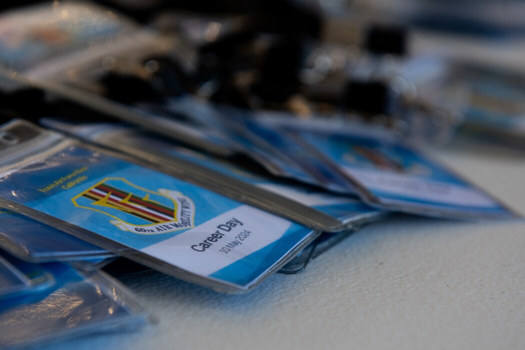 Badges sit on table ready to be handed out to students during Career Day