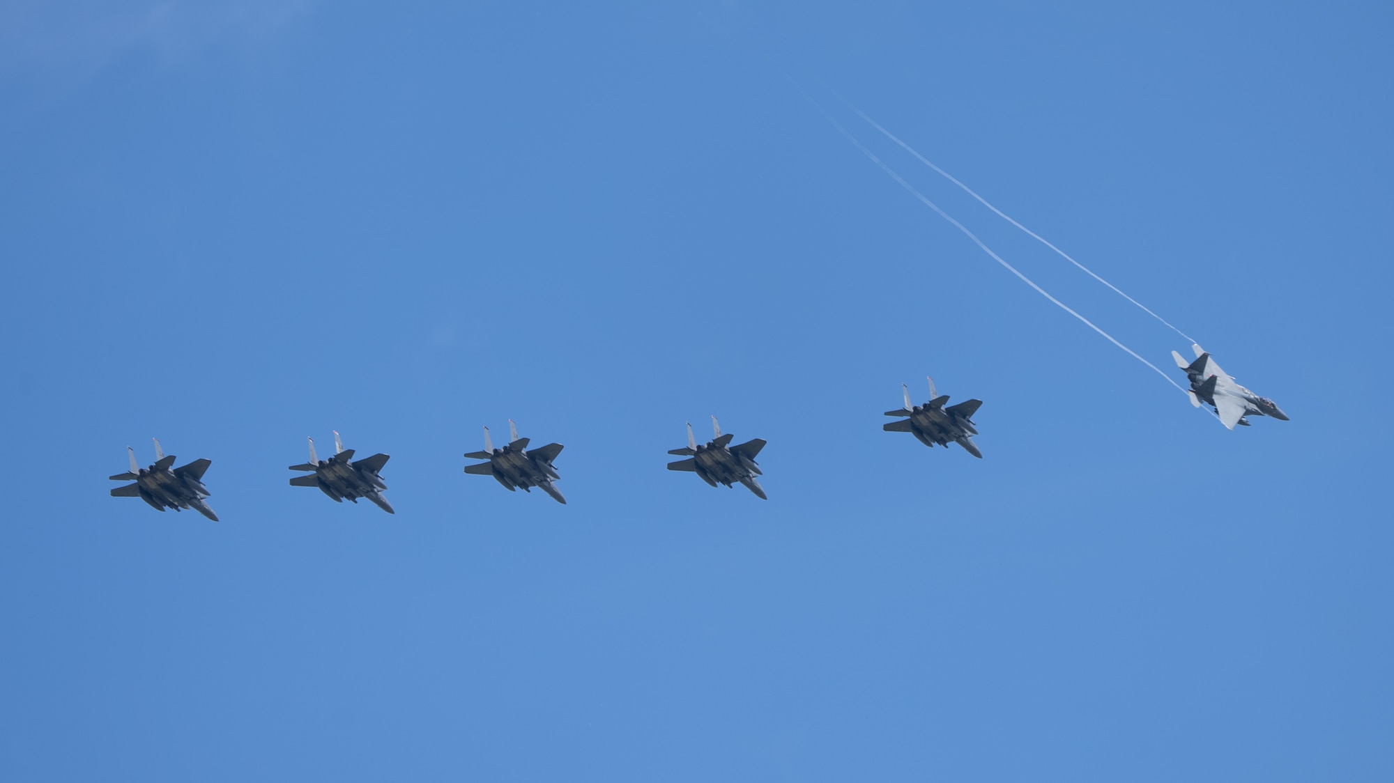 six aircraft in formation in sky