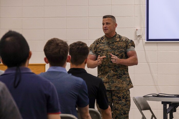 U.S. Marine Corps Maj. Richard Hayek, commanding officer Recruiting Station Kansas City, 9th Marine Corps District, speaks to officer candidates during the 9th Marine Corps District Mini Officer Candidate School, at Camp Dodge Iowa, April 2, 2024. During MINI OCS officer candidates prepared mentally and physically for the rigors of OCS the event culminated with officer candidates getting the opportunity to seek guidance and advice from the sergeant instructors and Marine Corps leaders from across the 9th Marine Corps Recruiting District. (U.S. Marine Corps photo by Cpl. Collette Hagen)
