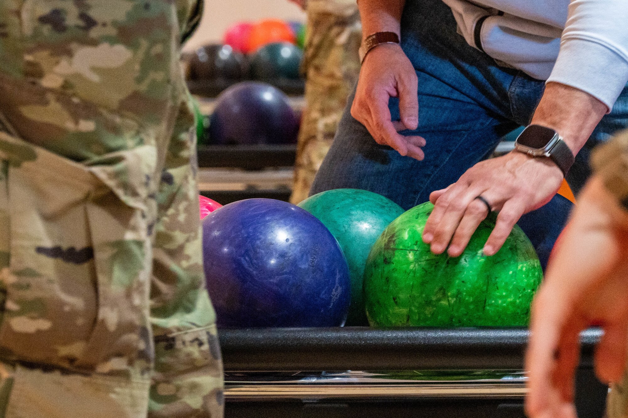 A competitor selects a bowling ball