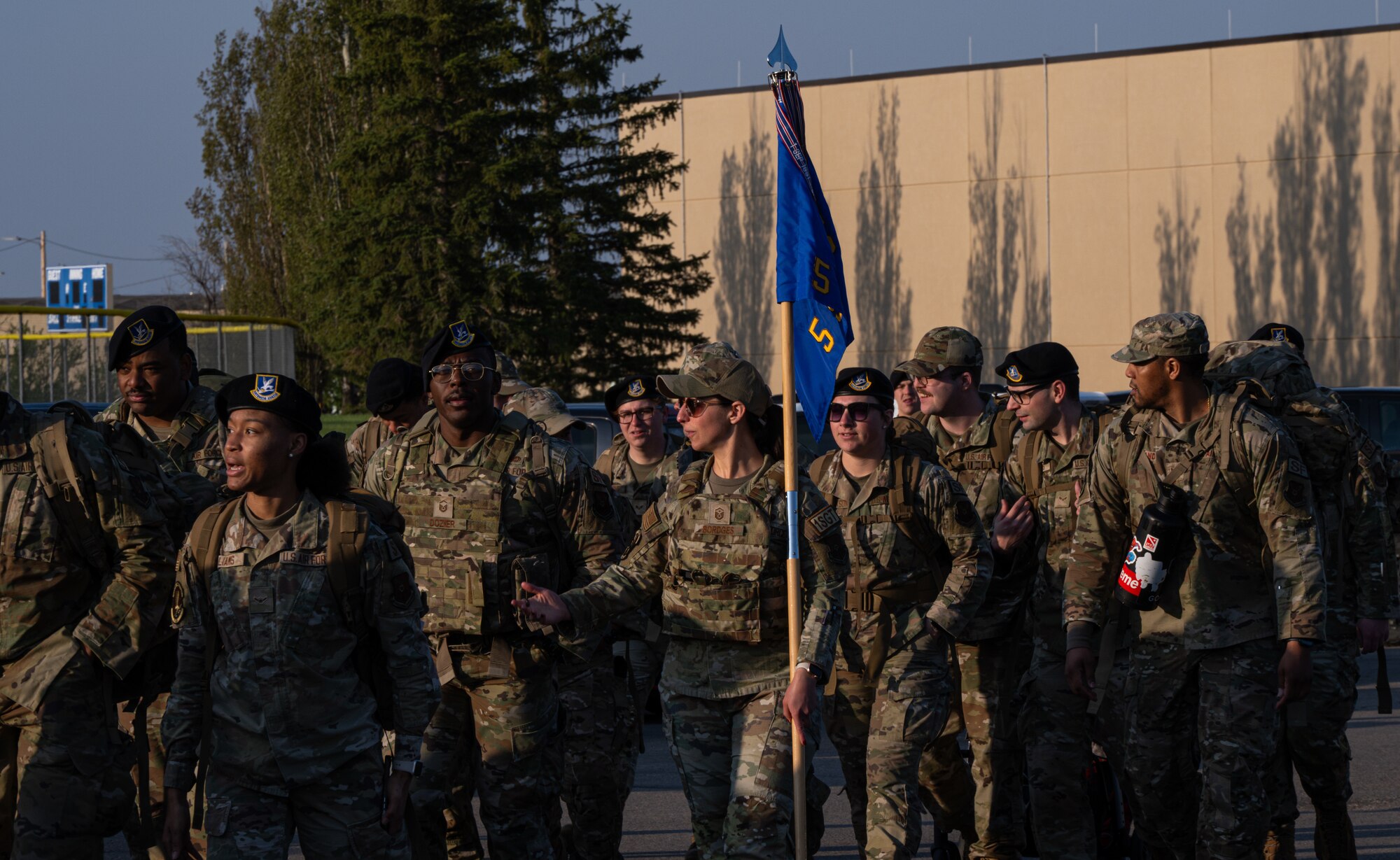 Defenders assigned to both the 5th Security Forces Squadron and 91st Security Forces Group, ruck to start National Police Week 2024 at Minot Air Force Base, North Dakota, May 13, 2024. National Police Week allows law enforcement, survivors and citizens to gather and pay respect to those who gave their lives in the line of duty while offering honor, remembrance, and peer support. (U.S. Air Force photo by Airman 1st Class Alyssa Bankston)