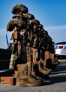 Battlefield crosses are displayed at the 2024 National Police Week opening ceremony at Minot Air Force Base, North Dakota, May 13, 2024. The battlefield cross is a symbol of honor and respect for fallen service members. (U.S. Air Force photo by Airman 1st Class Alyssa Bankston)