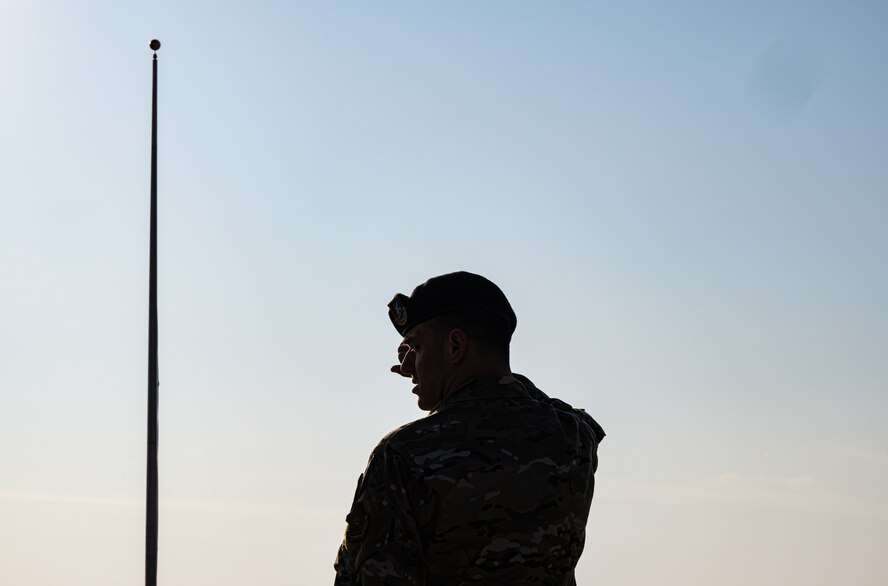 Senior Airman Joseph Ingram, 5th Security Forces Squadron Military Working Dog handler, attends the 2024 National Police Week opening ceremony at Minot Air Force Base, North Dakota, May 13, 2024. During National Police Week, law enforcement, survivors and civilians gather to honor, remember and support one another while paying tribute to those who lost their lives while performing their duties. (U.S. Air Force photo by Airman 1st Class Alyssa Bankston)