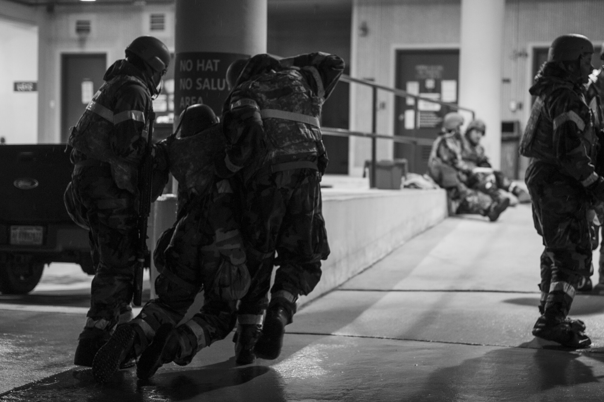 Airmen assigned to the 51st Medical Group practice carrying a patient with simulated leg injuries during Beverly Herd 24-1 at Osan Air Base, Republic of Korea, May 16, 2024. The 51st MDG medics prepare daily for any contingencies if and when they occur, with the foremost priority being ready to fight tonight. The Airmen of the 51st Fighter Wing continuously train to maintain the high level of full-spectrum readiness required to execute the mission proficiently and effectively. (U.S. Air Force photo by Senior Airman Kaitlin Frazier)