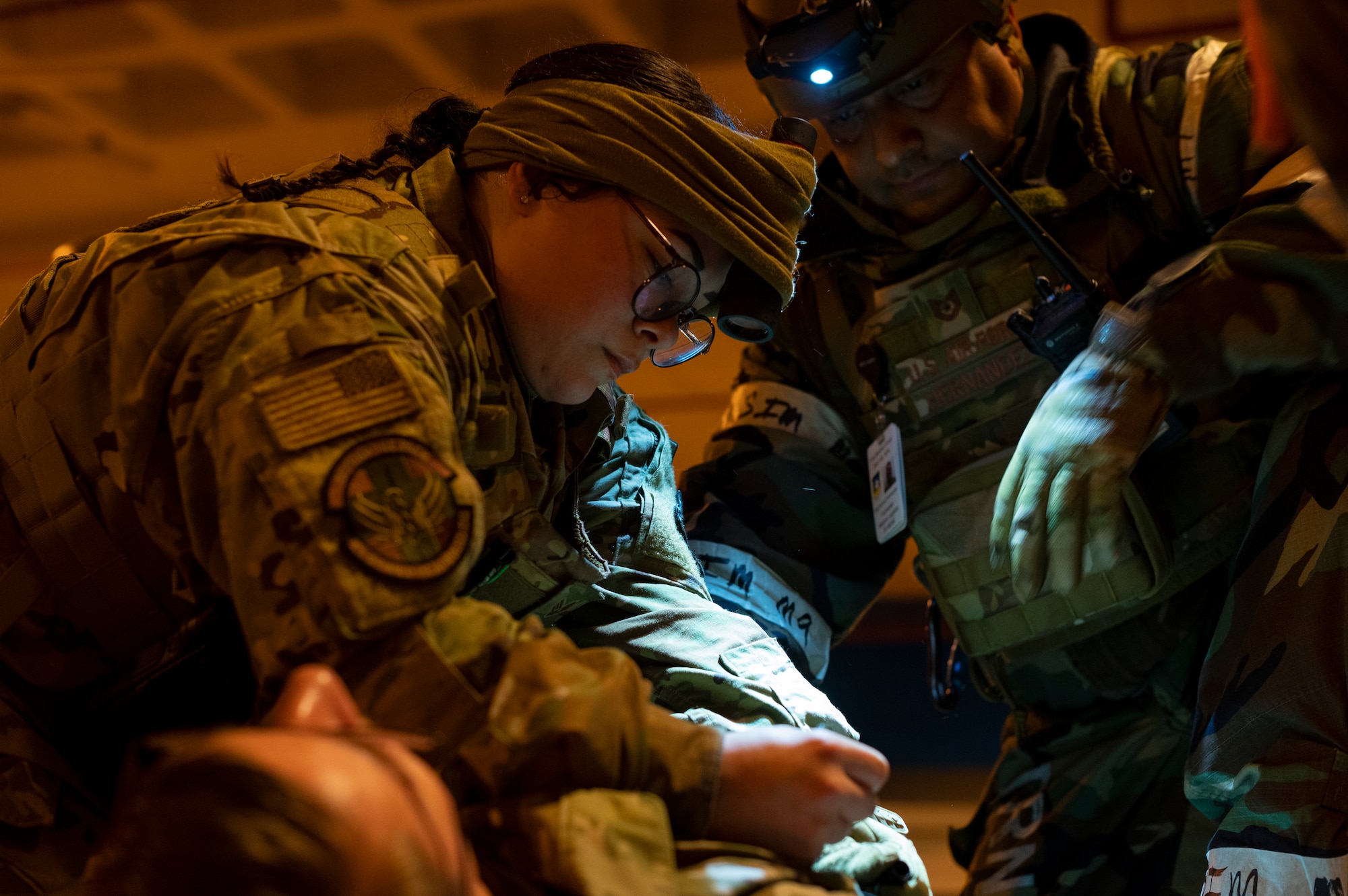 U.S. Air Force Senior Airman Kyndale Reyes, 51st Operational Readiness Squadron dental assistant, applies a tourniquet on a simulated patient during Beverly Herd 24-1 at Osan Air Base, Republic of Korea, May 16, 2024. Simulated patients were transported inside after being categorized by severity, enabling emergency room personnel to practice treating the most critically injured first upon arrival. As the most forward deployed permanently based wing in the Air Force, the 51st Fighter Wing is charged with providing mission-ready Airmen to execute combat operations and receive follow-on forces. (U.S. Air Force photo by Senior Airman Kaitlin Frazier)