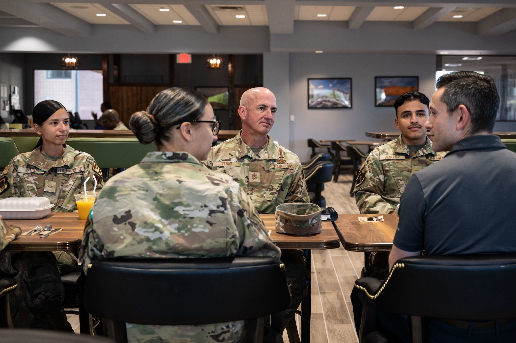 Chief Master Sgt. of the Air Force David Flosi, and the Honorable Alex Wagner, Assistant Secretary of the Air Force for Manpower and Reserve Affairs, interact with Airmen during a visit to Nellis Air Force Base, Nevada, May 7, 2024.