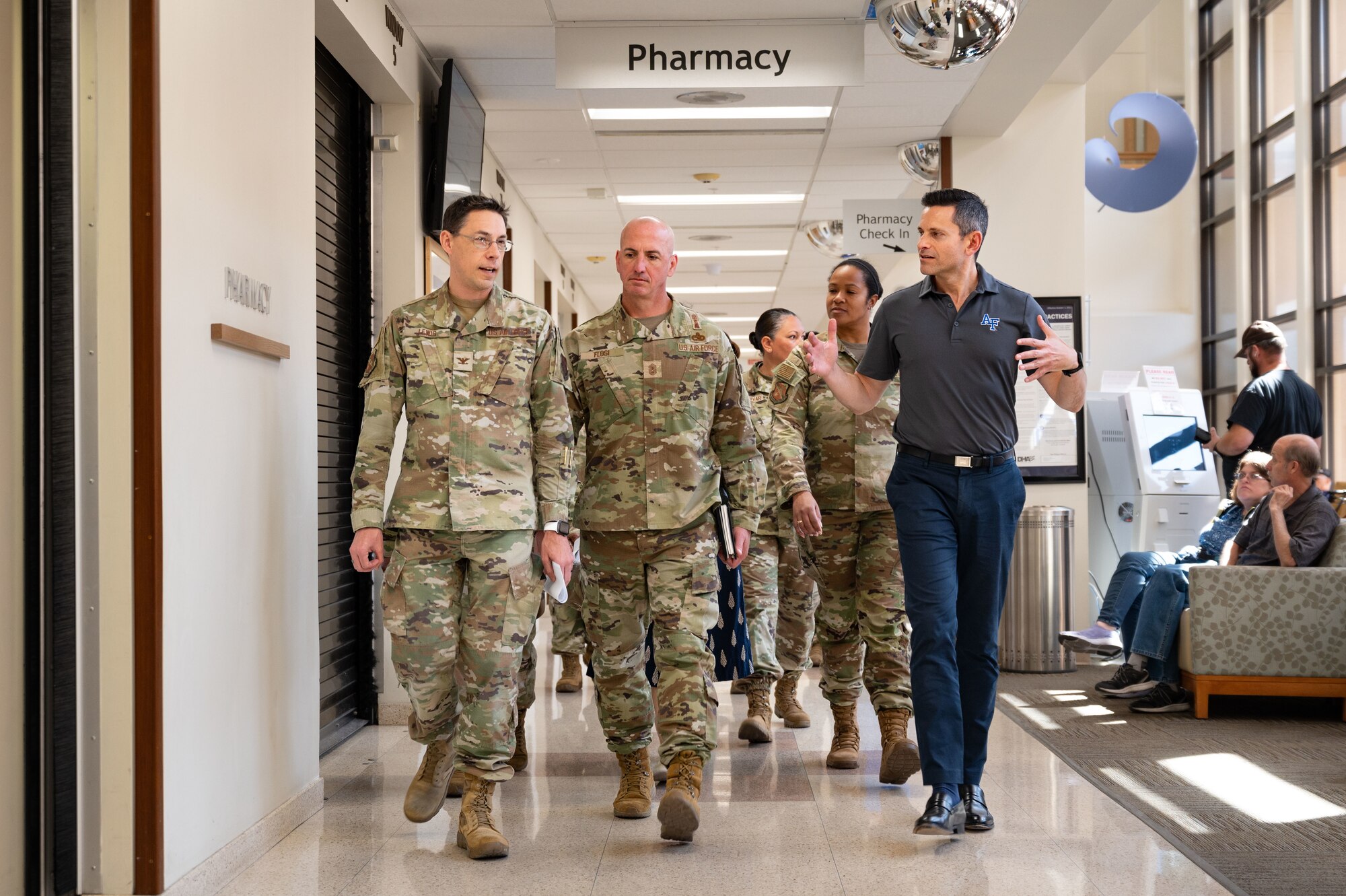 U.S. Air Force. Col. Aaron Lewis, chief of the medical staff assigned to the 99th Medical Group, briefs Chief Master Sgt. of the Air Force David Flosi, and the Honorable Alex Wagner, Assistant Secretary of the Air Force for Manpower and Reserve Affairs, on the Exceptional Family Member Program (EFMP) during a visit to Nellis Air Force Base, Nevada, May 7. 2024.