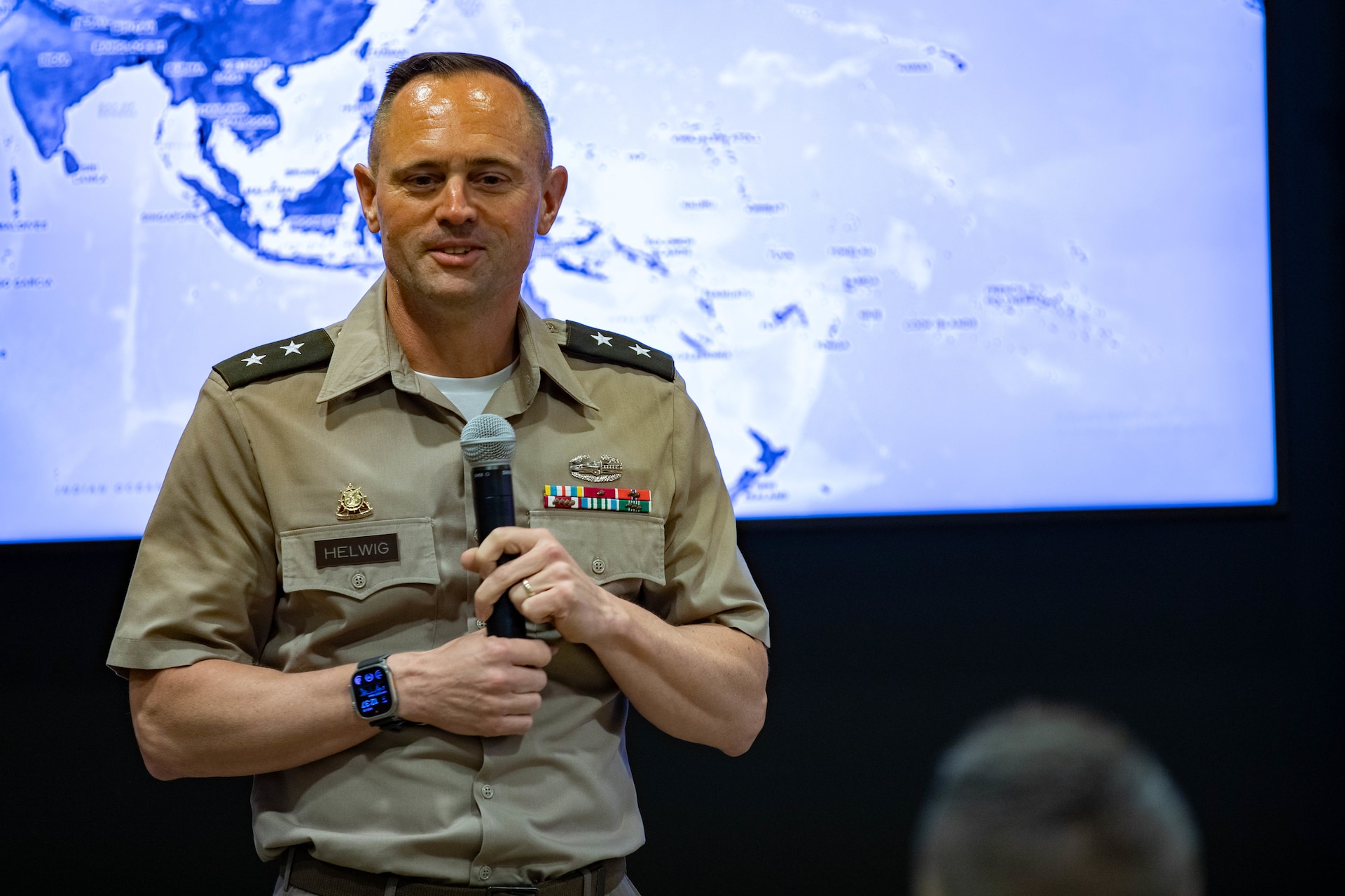 U.S. Army Maj. Gen. Jered Helwig, commanding general of the 8th Theater Sustainment Command, speaks on the unique capabilities of the 8th Theater Sustainment Command during Land Forces Pacific Symposium 2024 Honolulu, Hawaii, May 15, 2024. LANPAC allows the military to highlight their vital role in the Pacific theater. (U.S. Army photo by Spc. Devin Davis)