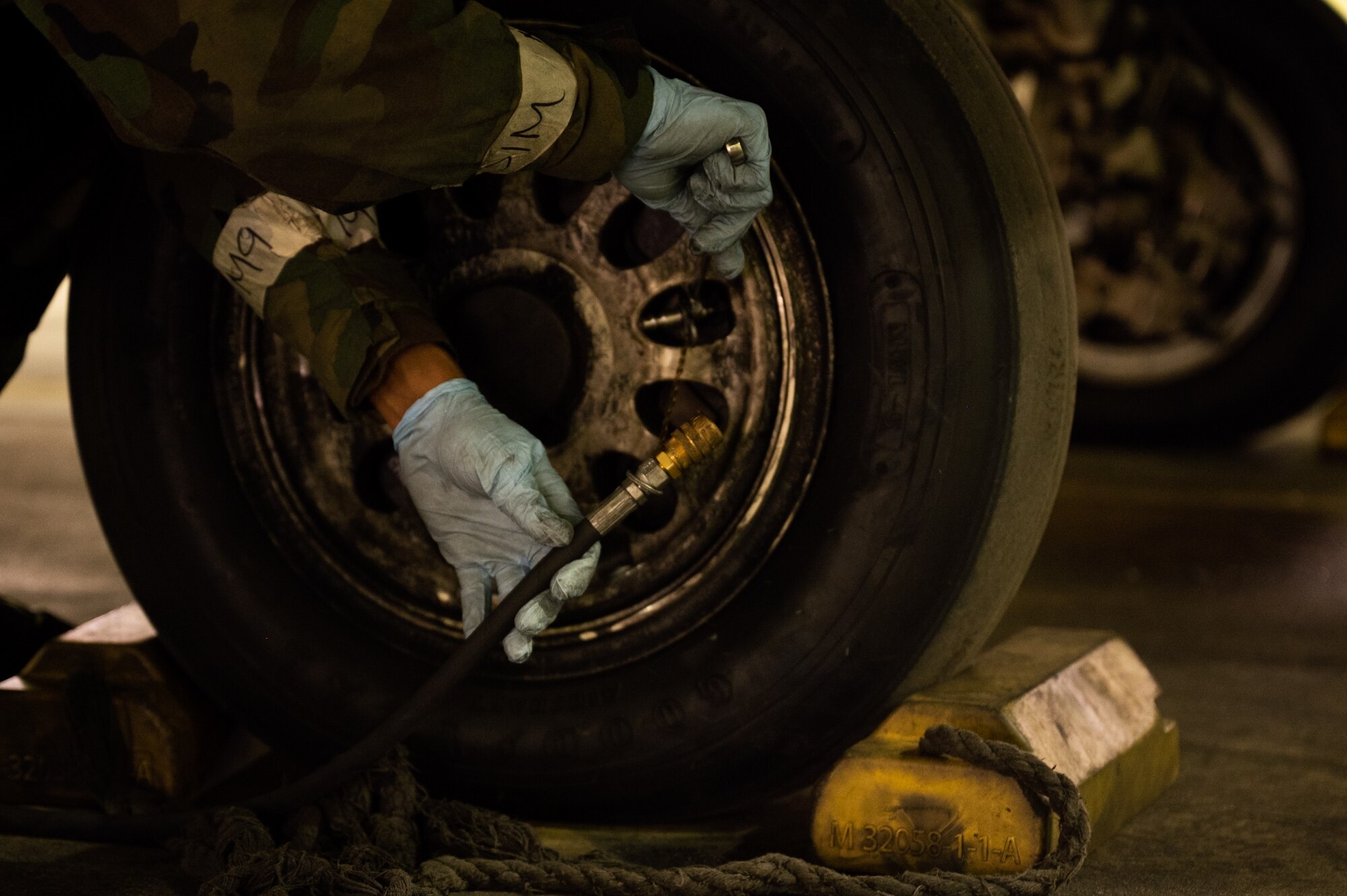U.S. Air Force Airman 1st Class Noah Woulard, 36th Fighter Generation Squadron assistant dedicated crew chief, services a tire on an F-16 Fighting Falcon during Beverly Herd 24-1 at Osan Air Base, Republic of Korea, May 15, 2024. The 36th FGS mission is to prepare for and execute immediate air combat operations. Training is conducted throughout the year to generate combat airpower at a moment’s notice, affirming the commitment to the Republic of Korea remains ironclad and ensures regional stability throughout the U.S. Indo-Pacific Command. (U.S. Air Force photo by Tech. Sgt. Clayton Lenhardt)