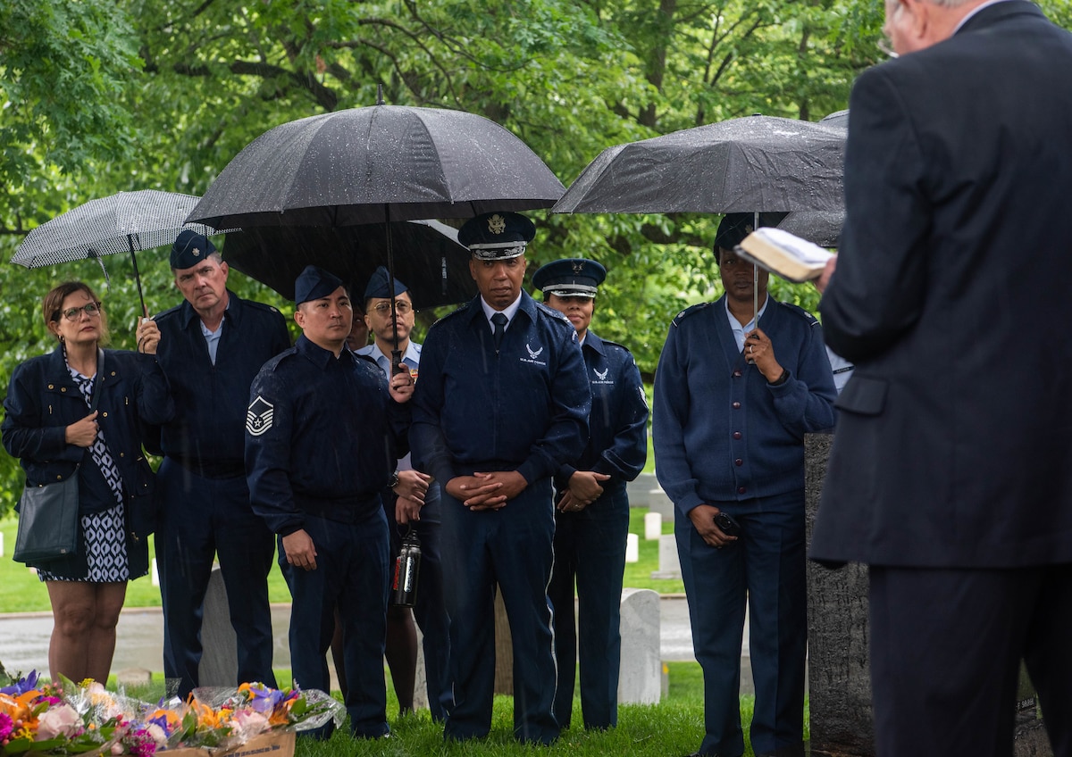Members of the U.S. Air Force Chaplain Corps listen to remarks by retired Chaplain (Maj. Gen.) Charles Baldwin, former Air Force chief of chaplains, at Chaplains Hill at Arlington National Cemetery in Arlington, Va.