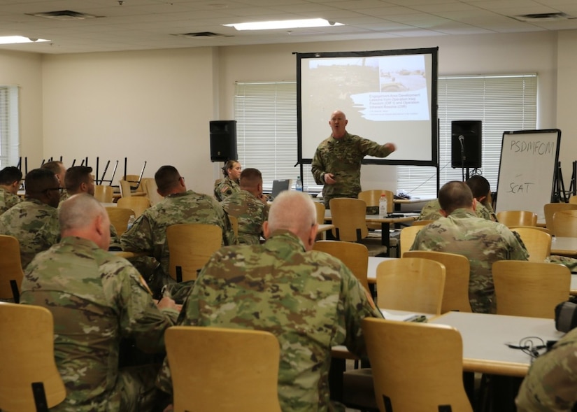 A soldiers teaches a class.