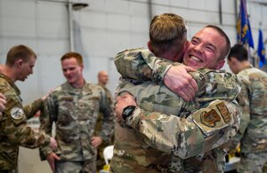 Master Sgt. Lance Cooper, quality assurance NCO in charge at the 32nd Aerial Port Squadron celebrates their win as the Best Overall Team during the 2024 Port Dawg Challenge at Dobbins Air Reserve Base, Georgia, April 18, 2024. This was the first win for the 32 APS and the first win for a 4th Air Force unit. (U.S. Air Force photo by Master Sgt. Diana E. Ferree)