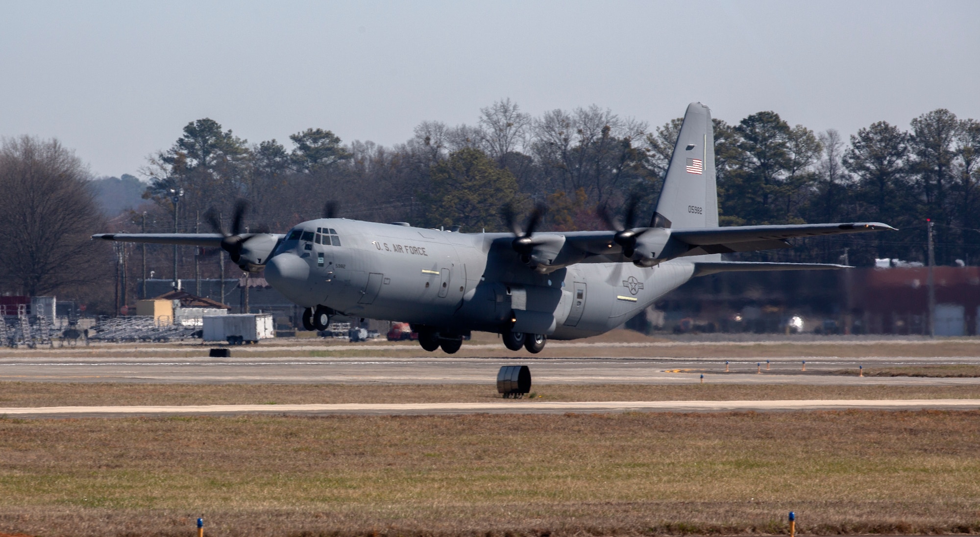 A C-130J-30 Super Hercules aircraft takes off from the runway adjacent to Lockheed Martin's Marietta, Georgia, C-130J production plant for its maiden flight, Feb. 26, 2024.