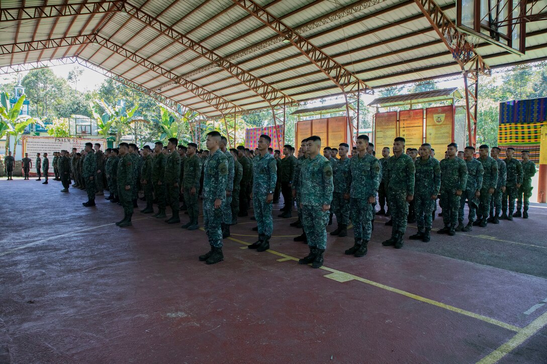 U.S. Marines with 1st Battalion, 7th Marine Regiment, 1st Marine Division, and service members with the Armed Forces of the Philippines attend an orientation brief during Archipelagic Coastal Defense Continuum in Barira, Philippines, May 13, 2024. ACDC is a series of bilateral exchanges and training opportunities between U.S. Marines and Philippine Marines aimed at bolstering the Philippine Marine Corps’ Coastal Defense strategy while supporting the modernization efforts of the Armed Forces of the Philippines. (U.S. Marine Corps photo by Cpl. Kayla Halloran)
