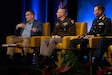 Retired U.S. Army Maj. Gen. Steven Shapiro (left), U.S. Army Maj. Gen. Jered Helwig, 8th Theater Sustainment Command commanding general (middle), and Canadian Armed Forces Lt. Gen. Derek Macaulay, United Nations Command deputy commander discuss the importance of creating and maintaining joint interior lines during the Land Forces Pacific Symposium and Exhibition, May 16, 2024, in Honolulu, Hawaii. Joint Interior Lines is the Theater Army building forward positions to create enduring  advantage, operational reach, and operational endurance for the joint force. (U.S. Army photo by Sgt. Johanna Pullum)