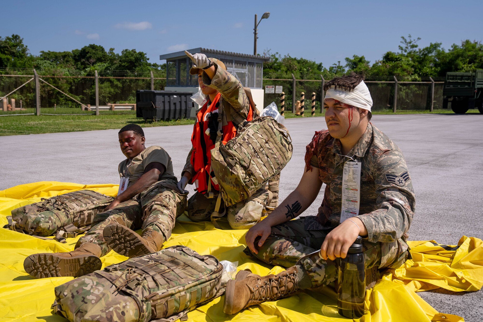 Airmen sit and wait during Ready Eagle