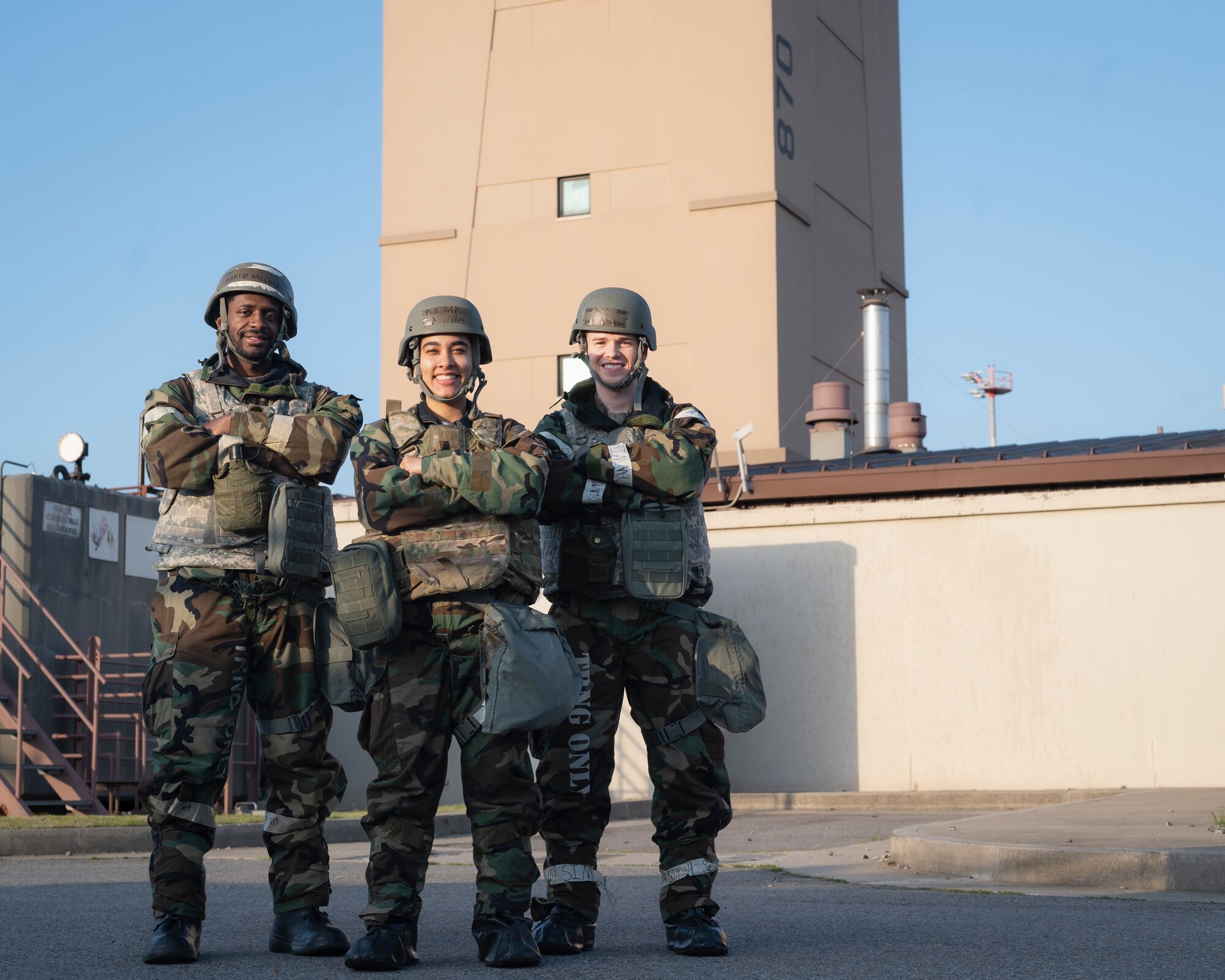 U.S. Air Force Airmen assigned to the 51st Operations Support Squadron stand together in mission-oriented protective posture level two during Beverly Herd 24-1 at Osan Air Base, Republic of Korea, May 16, 2024. The 51st OSS is responsible for training, flight operations, intelligence, operational plans, airfield management and weather forecasting to enable the 51st Fighter Wing to execute the mission. Routine training events like Beverly Herd are pivotal platforms for 51st Fighter Wing Airmen to refine their warfighting proficiencies through practical application, concurrently enhancing their ability to respond skillfully to contingencies. (U.S. Air Force photo by Senior Airman Sabrina Fuller-Judd)