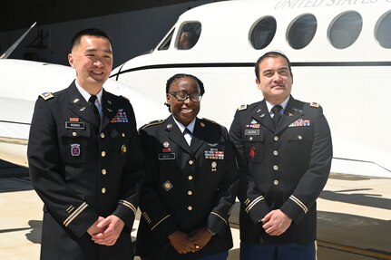 Lt. Col. Ryan Rooks, State Army Aviation Officer (SAAO), District of Columbia Army National Guard stands for a photograph with members of his staff at Davison Army Airfield, Va., April 16, 2024. DCARNG Aviation is comprised of four different units with AAPIs visibly represented in all sections from pilots and maintainers to administration and operations.