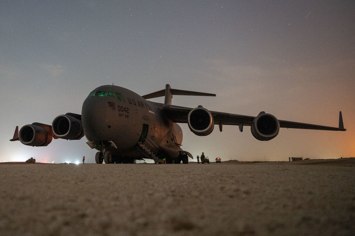 A U.S. Air Force C-17 Globemaster III delivers supplies to an undisclosed location within the U.S. Central Command area of responsibility, April 30, 2024. The U.S. Air Force is globally postured to protect and defend freedom of coalition allies and regional partners within the CENTCOM area of responsibility to maintain peace and stability across the region. (U.S. Air Force photo by Airman 1st Class Thomas Hansford)