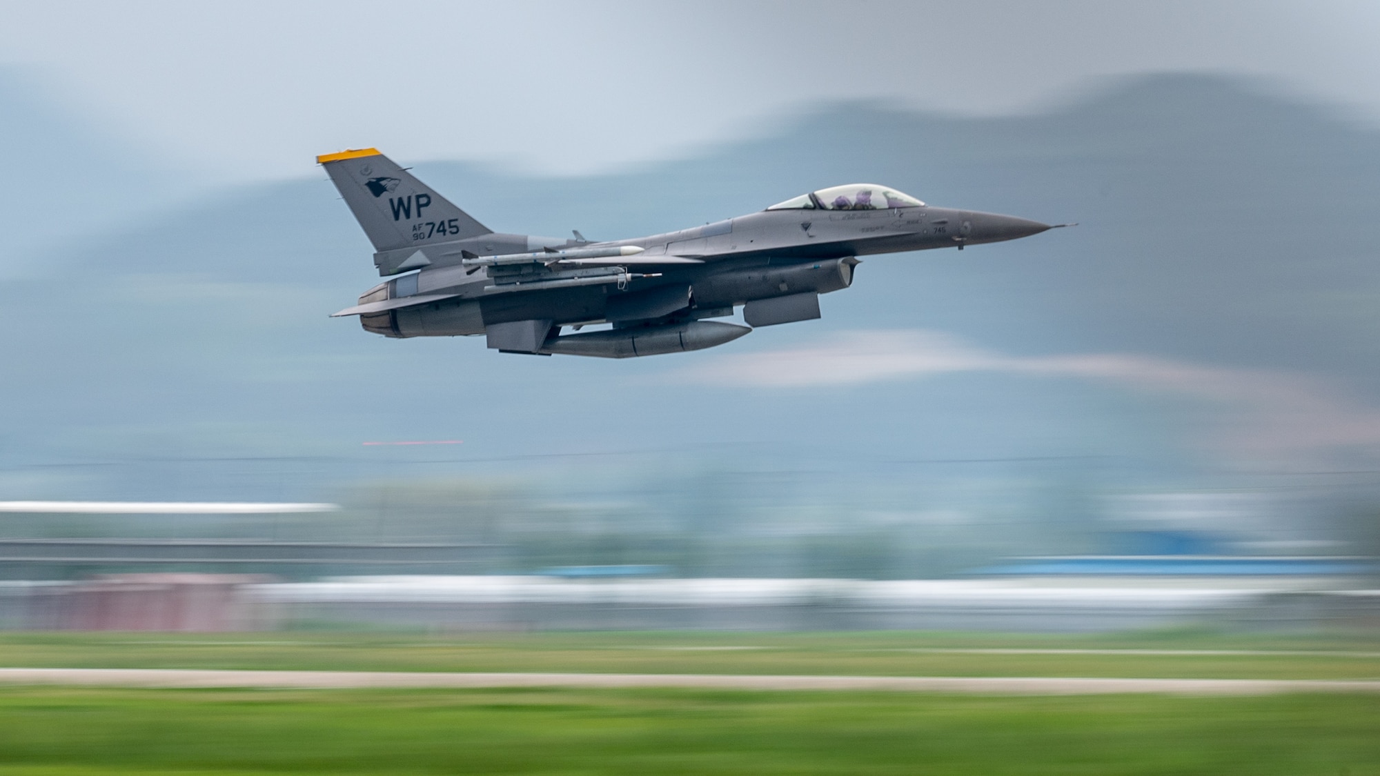 An U.S. Air Force F-16 Fighting Falcon assigned to the 80th Fighter Squadron takes off