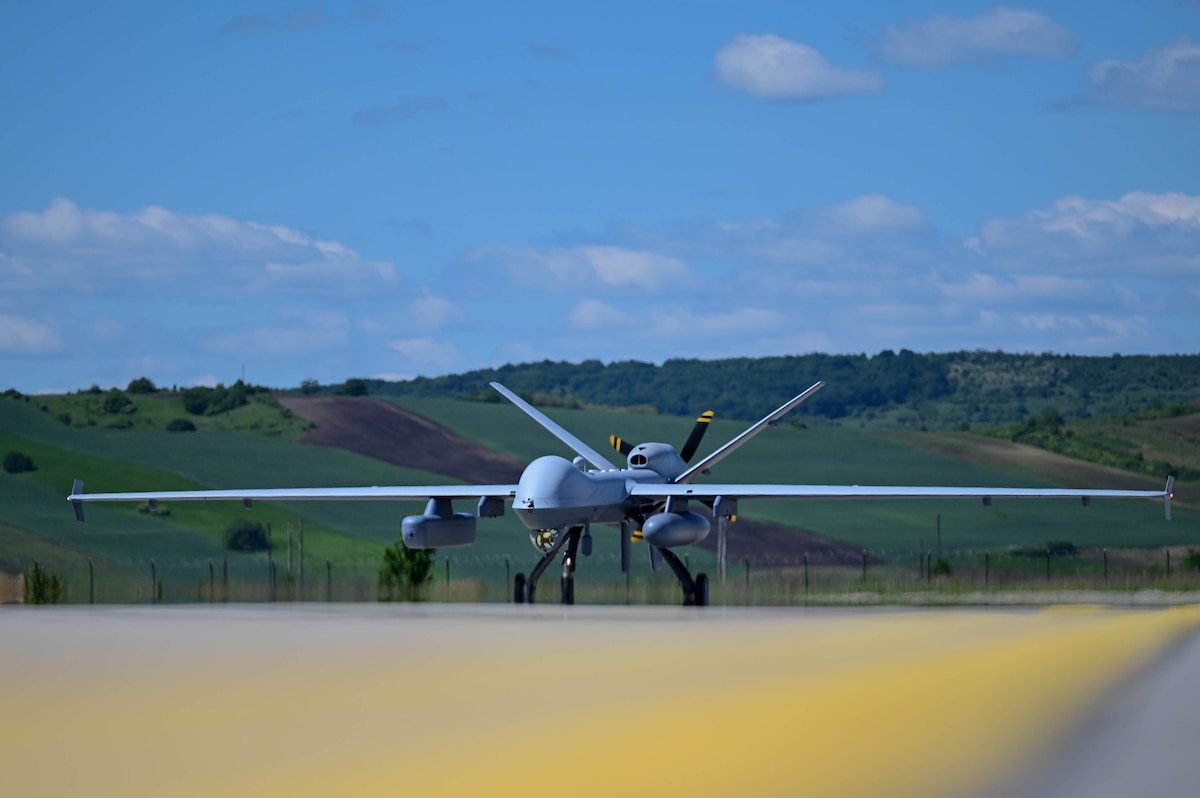 A remotely piloted U.S. Air Force MQ-9 Reaper returns to Câmpia Turzii, Romania, after completing a sortie May 13, 2024. The MQ-9 represents a significant advancement in unmanned aerial capabilities, providing U.S. forces with a versatile platform for surveillance and precision strike missions. (U.S. Air Force photo by Senior Airman Raya Feltner)