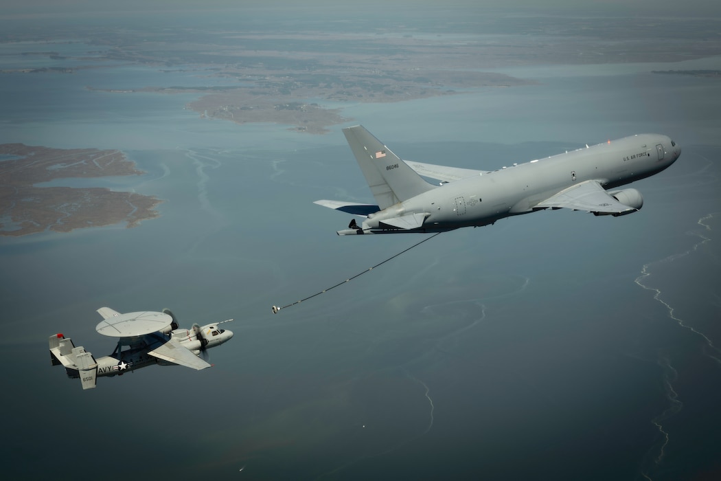 A KC-46A Pegasus conducts tanker-receiver aerial refueling compatibility testing with an E-2D Advanced Hawkeye