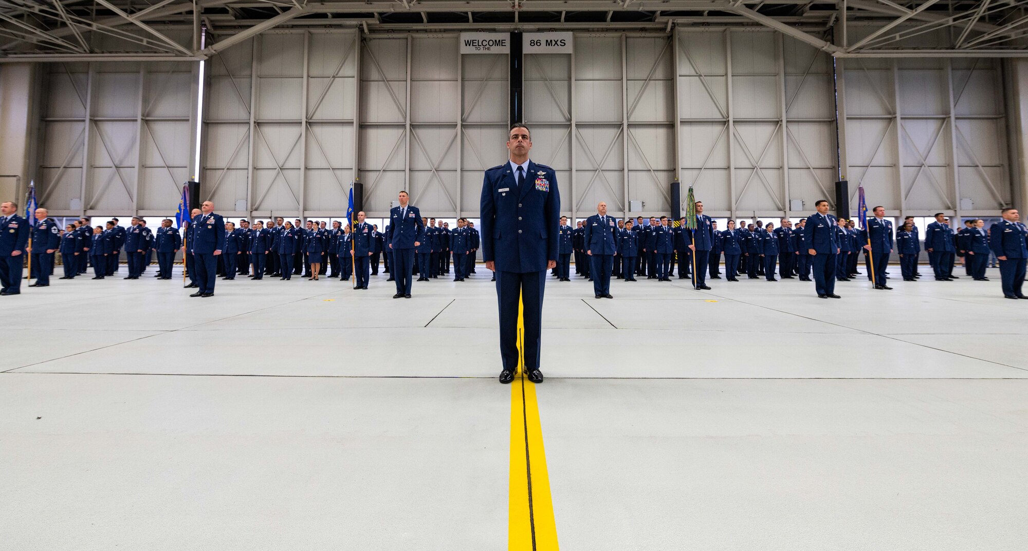 Airmen stand in formation during a ceremony