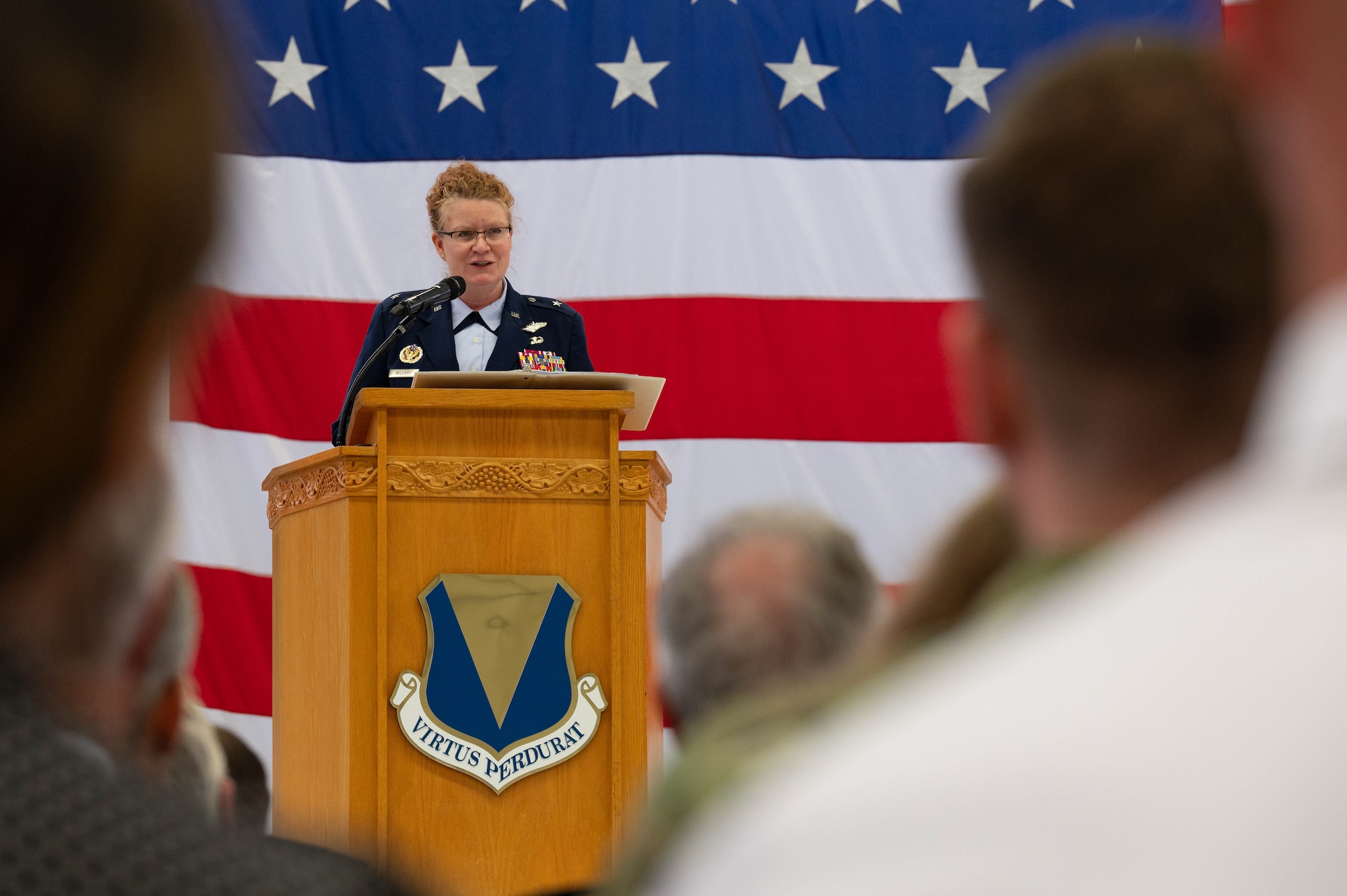 commander speaks to an audience