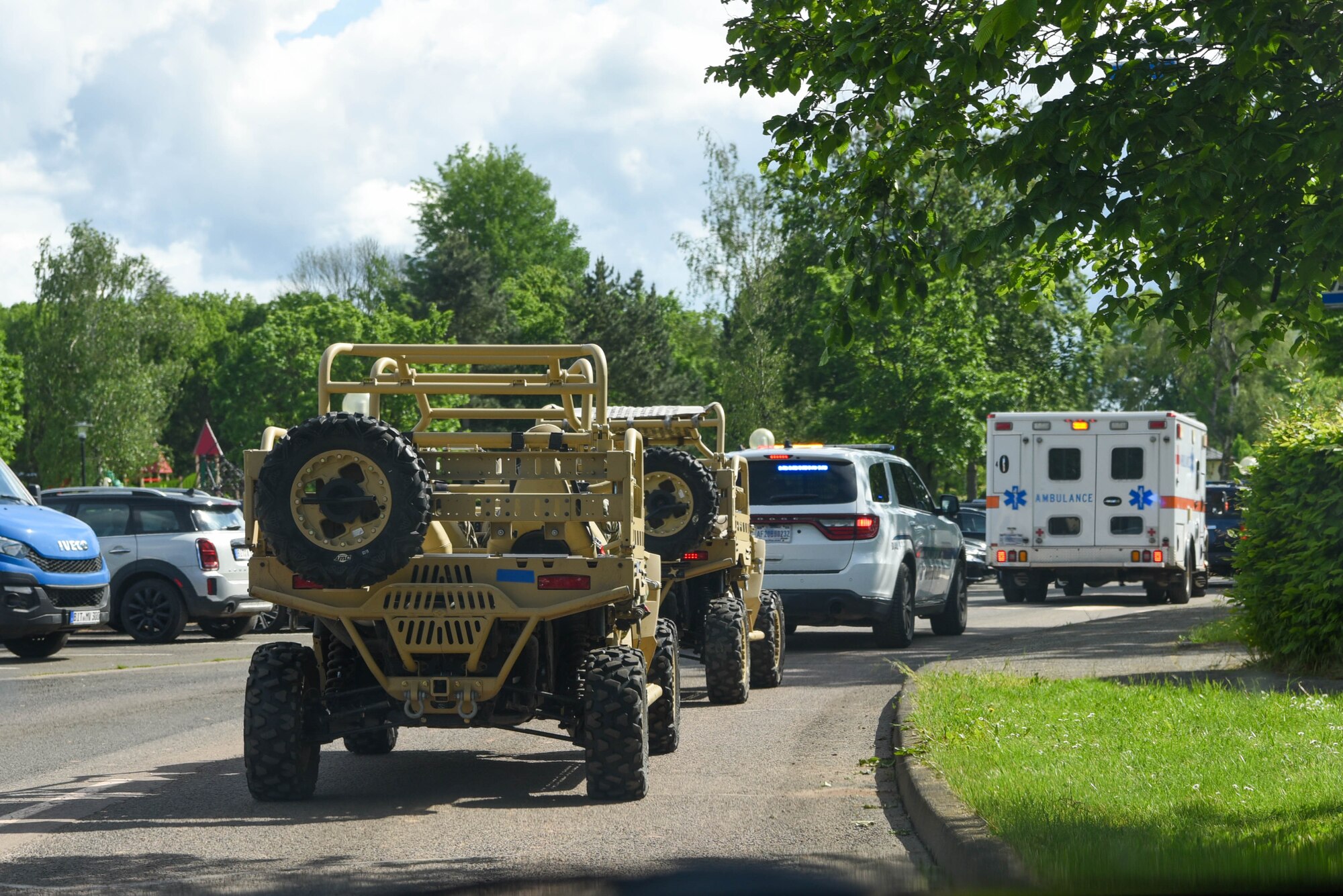 First responders are driving in a parade.